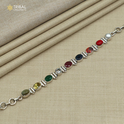 Sterling silver Navratan stone bracelet by TRIBAL ORNAMENTS, unisex jewelry with colorful stones, handcrafted and stylish.