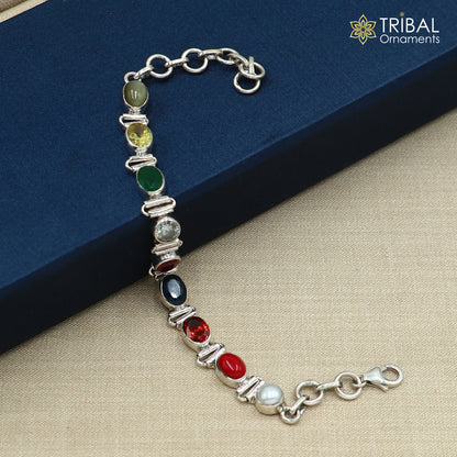 Sterling silver Navratan stone bracelet by Tribal Ornaments, unisex jewelry with colorful stones and intricate handmade design.
