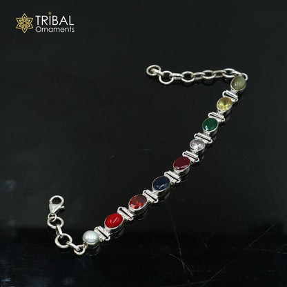 Sterling silver Navratan stone unisex bracelet featuring colorful stones, handcrafted by Tribal Ornaments.