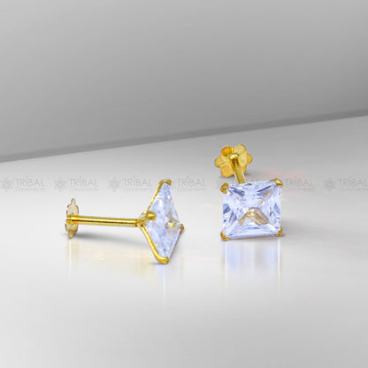 14K yellow gold and white diamond unisex stud earring by Tribal Ornaments, showcasing a sparkling diamond set in gold.