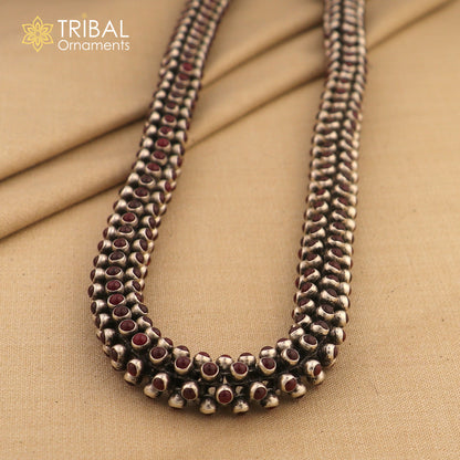19-inch sterling silver chain with a stylish red stone, heavy design, by TRIBAL ORNAMENTS, showcasing detailed craftsmanship.