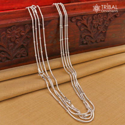 Sterling silver 18-inch handmade snake chain necklace with a smooth, shiny finish, featuring a trendy, elegant design.