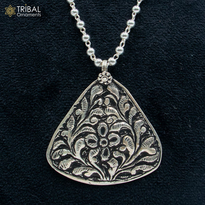 Sterling silver beaded necklace with flower design, traditional tribal jewelry set, long pendant chain with cultural craftsmanship.