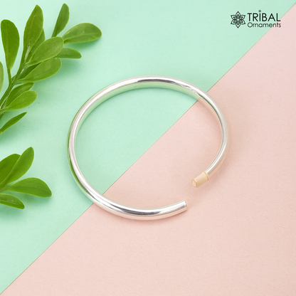 Sterling silver 4mm baby bracelet bangle featuring a traditional sikha design, handmade Punjabi kada for newborn kids by TRIBAL ORNAMENTS.
