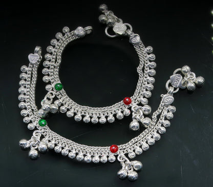 Sterling silver baby anklet with noisy sound bells and charm, handmade tribal jewelry for kids with intricate design.