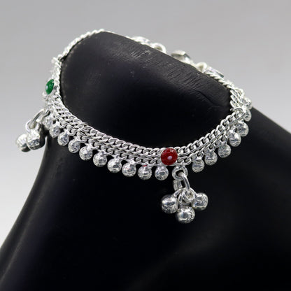 Handmade 5.5-inch sterling silver anklet for kids with noisy sound bells and charm, featuring intricate tribal design from India.