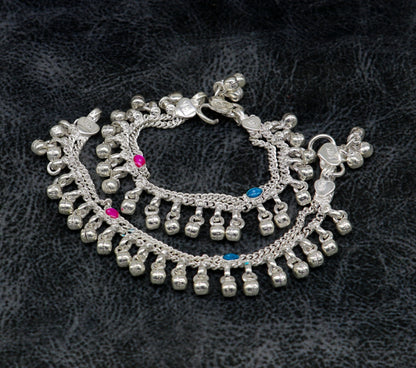 Customized 5-inch unisex baby anklet with bells and charm, featuring tribal design and adjustable ankle strap by Tribal Ornaments.