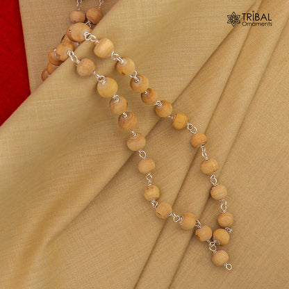 Sterling silver handmade white Tulsi beads jaap mala for meditation and mantra chanting, featuring traditional beaded necklace design.