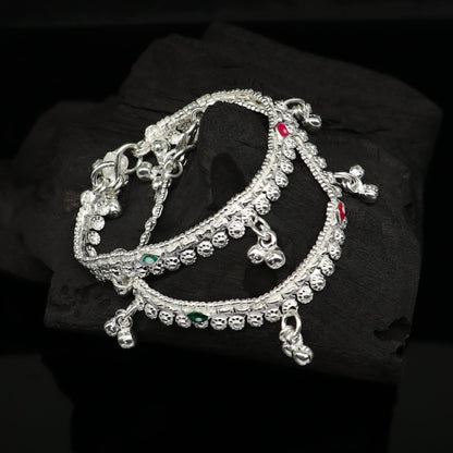 Sterling silver handmade baby anklet with jingling charms, customized design, perfect for kids jewelry and gifting.