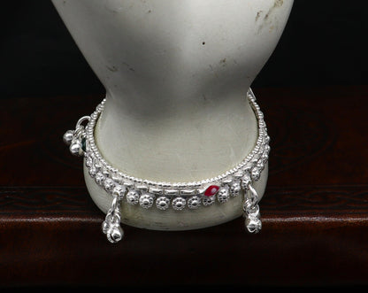 Sterling silver handmade baby anklet with jingling charms, customized design, perfect for kids jewelry and gifting.