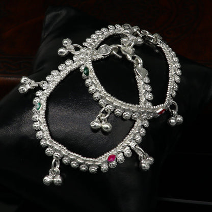 Sterling silver handmade baby anklet with jingling charms, customized design, ideal for kids jewelry and gifting.