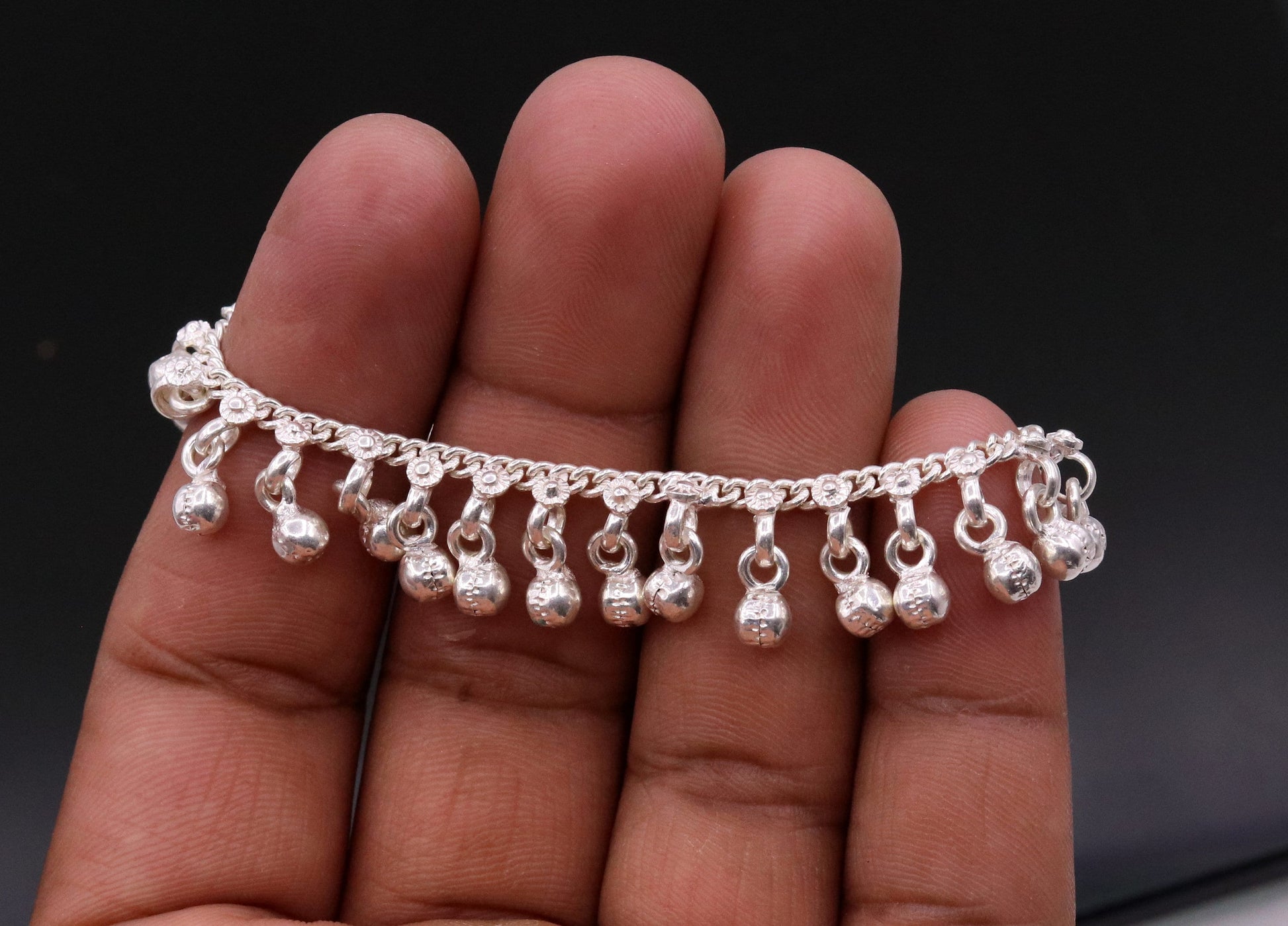 Vintage sterling silver baby anklet with hanging bell charms, handmade tribal design, 6-inch length, charming and lightweight.
