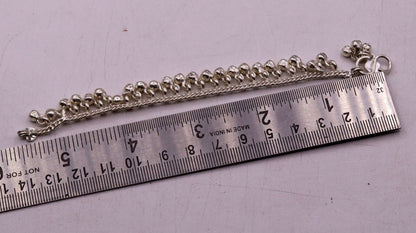 Sterling silver vintage baby anklet with hanging bell charms, handmade tribal design, 6-inch length, tribal ornaments brand.