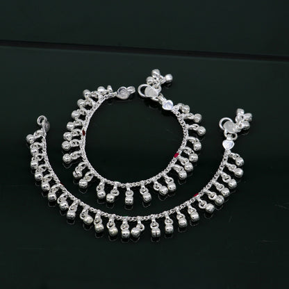 Sterling silver handmade waved noisy bells anklet for babies and kids, featuring hanging bells and intricate tribal design.
