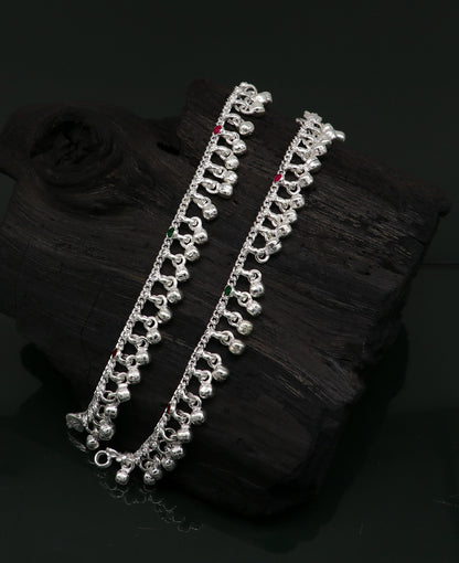 Sterling silver handmade baby anklet with waved hanging noisy bells, tribal design, perfect for kids jewelry from India.