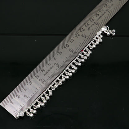 Sterling silver handmade waved ankle bracelet with hanging noisy bells, suitable for kids and babies, from Tribal Ornaments India.