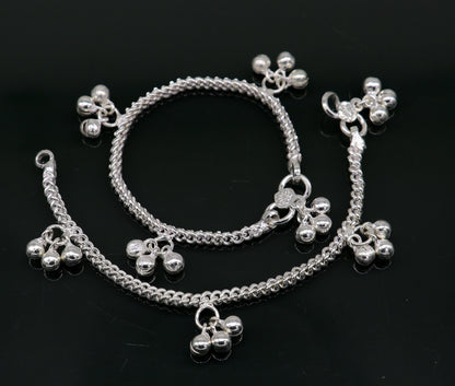 Sterling silver kids ankle bracelet with colorful noisy bells, custom designer baby anklet, from Tribal Ornaments India.