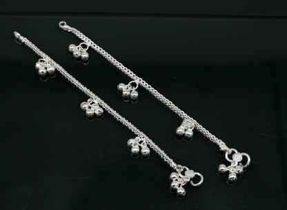 Sterling silver kids anklet with colorful noisy bells, designer baby ankle bracelet from TRIBAL ORNAMENTS, featuring custom charms.