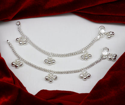 Sterling silver kids anklet with noisy bells and charms, handcrafted designer baby ankle bracelet from TRIBAL ORNAMENTS, India