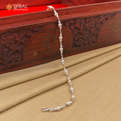 Handmade 7.5-inch sterling silver beaded bracelet with natural pearl, unisex jewelry by TRIBAL ORNAMENTS, suited for gifting.