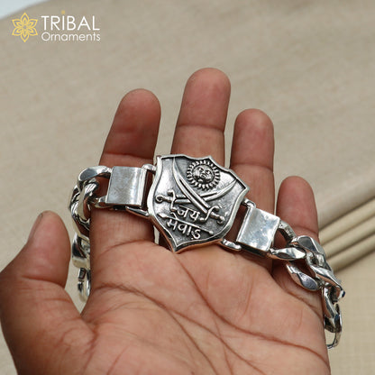 Sterling silver 7.5-inch Jai Mewar logo heavy chain bracelet for men, featuring intricate tribal design and bold jewelry style.