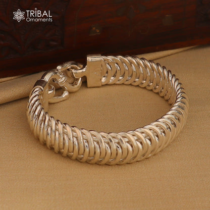 Sterling silver 8.5-inch curb chain bracelet for men and women by TRIBAL ORNAMENTS, stylish unisex jewelry accessory.