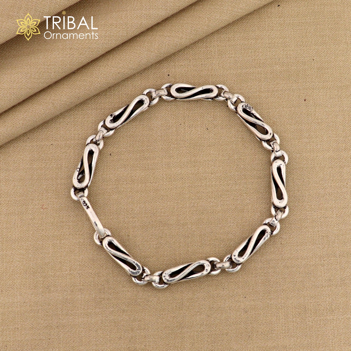 Elegant 8-inch sterling silver oxidized chain bracelet with personalized design from TRIBAL ORNAMENTS, showcasing intricate craftsmanship.