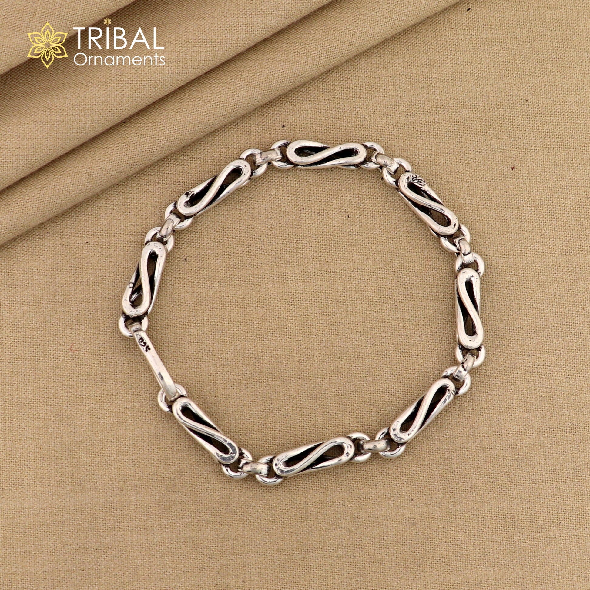 Elegant 8-inch sterling silver oxidized chain bracelet with personalized design from TRIBAL ORNAMENTS, showcasing intricate craftsmanship.
