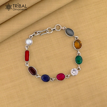 925 sterling silver Navratan stone nine-stone bracelet from Tribal Ornaments, featuring colorful stones and intricate handmade jewelry design.