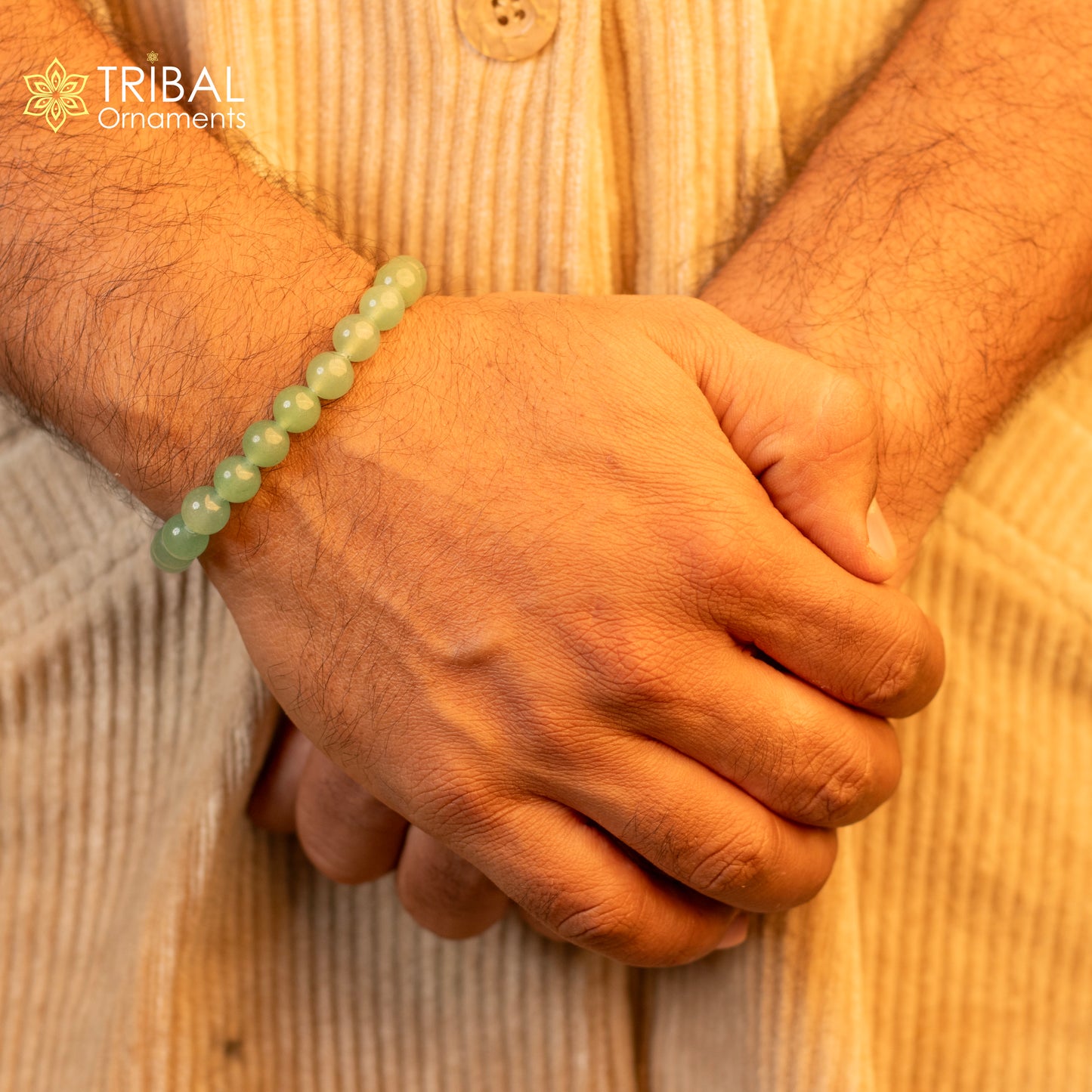 Handmade unisex bracelet with 8mm green aventurine natural gemstone beads by TRIBAL ORNAMENTS.