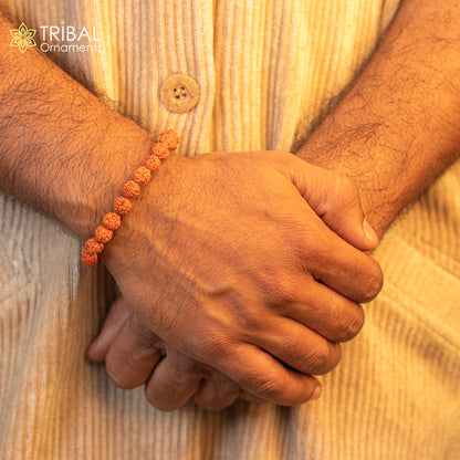Handmade 8mm Rudraksha beaded bracelet by TRIBAL ORNAMENTS, natural unisex jewelry with customized design.
