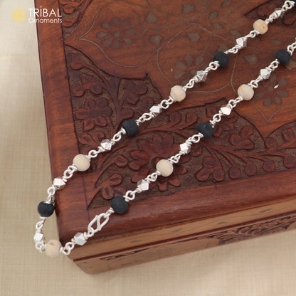Handcrafted 925 silver Black Basil rosary beads with silver beads on a necklace chain, used as Tulsi mala for Ayurveda and meditation.