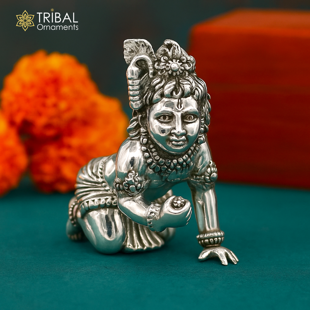 Small 925 silver handmade Krishna idol sculpture of crawling Ladu Gopal for home temple puja, crafted by TRIBAL ORNAMENTS.