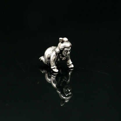 925 solid silver handmade Little Krishna idol, crawling baby statue for home temple puja, crafted by TRIBAL ORNAMENTS.