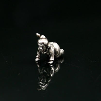 925 solid silver handmade Little Krishna idol, crawling baby statue for home temple puja, crafted by Tribal Ornaments.
