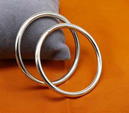 Sterling silver customized round bangle bracelet by TRIBAL ORNAMENTS, stylish designer jewelry for brides and gifting.