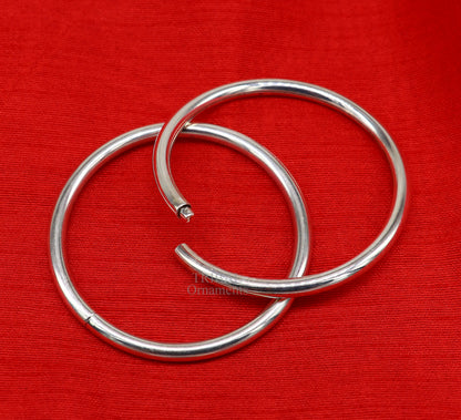 Sterling silver round design bangle bracelet by TRIBAL ORNAMENTS, plain and customized, stylish jewelry for brides and gifting.