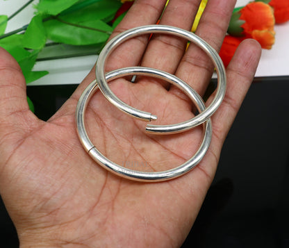 Sterling silver customized round bangle bracelet by TRIBAL ORNAMENTS, stylish designer jewelry for brides and special gifting occasions.