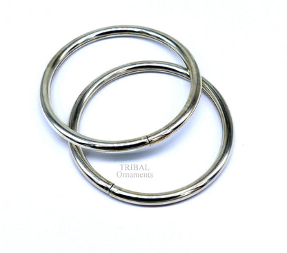 Sterling silver TRIBAL ORNAMENTS bangle bracelet with a plain round design, stylish jewelry for brides and gifting.
