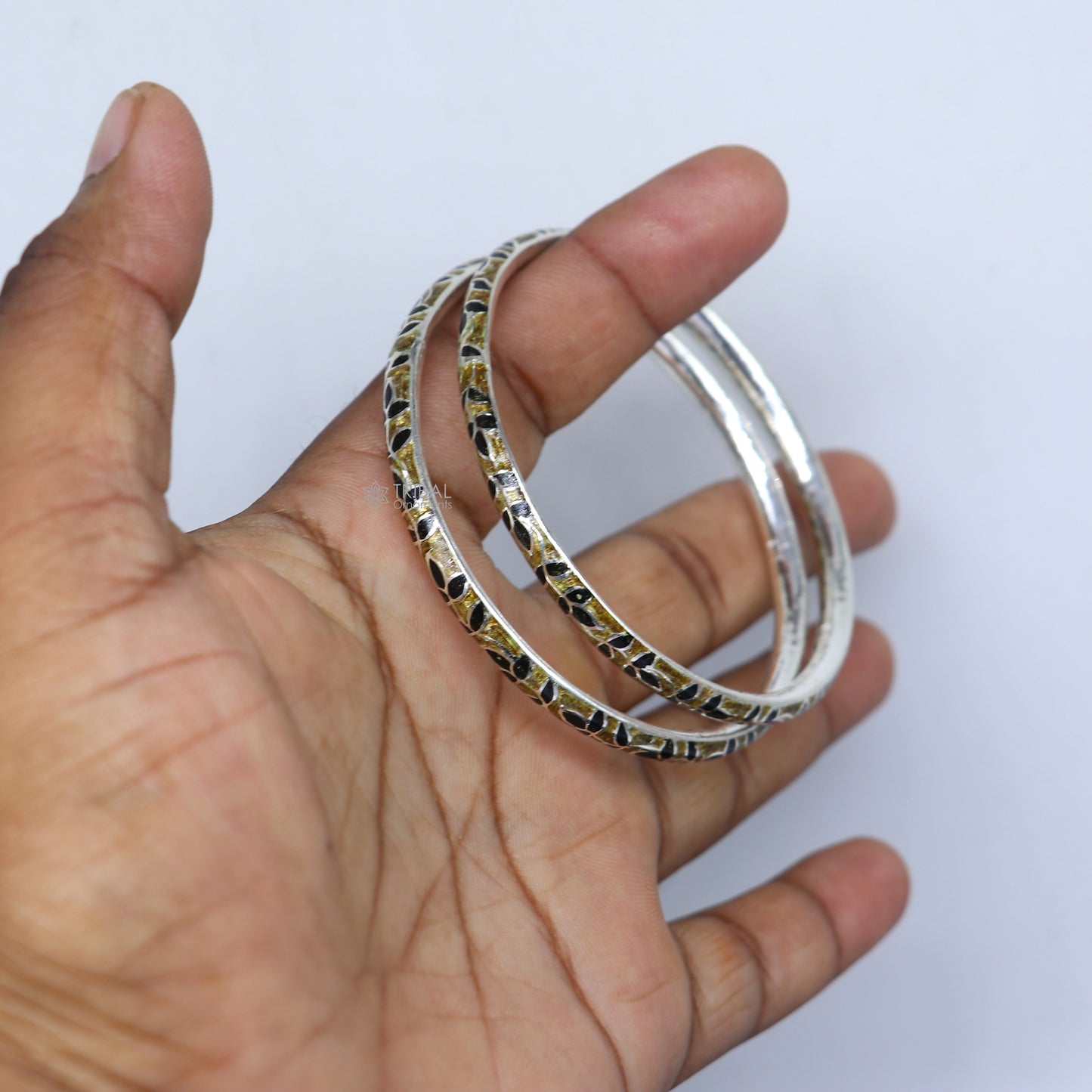 Sterling silver meenakari work designer bangle bracelet by TRIBAL ORNAMENTS, featuring intricate craftsmanship for brides and gifting.