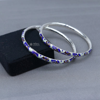 Sterling silver Meenakari work designer bangle bracelet by TRIBAL ORNAMENTS featuring intricate jewelry design and vibrant colorful patterns.