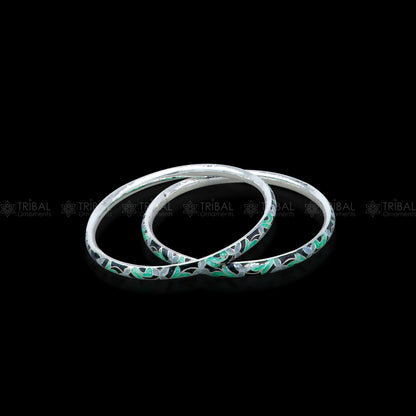 Sterling silver Meenakari work designer bangle bracelet by TRIBAL ORNAMENTS, showcasing intricate jewelry craftsmanship.