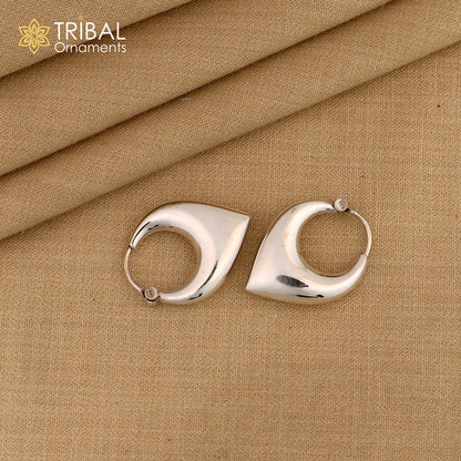 Sterling silver handmade vintage unisex hoop earrings with tribal and ethnic Bali design, crafted by TRIBAL ORNAMENTS.
