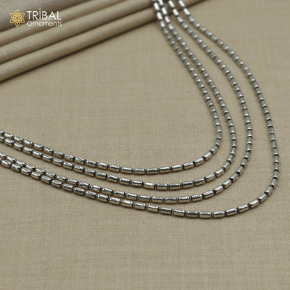 Sterling silver 4-line beaded chain necklace set by TRIBAL ORNAMENTS, featuring intricate tribal jewelry design with beaded accents.