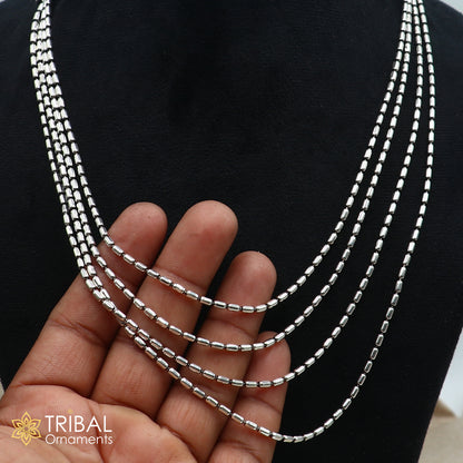 Sterling silver 4-line beaded chain necklace set by TRIBAL ORNAMENTS featuring intricate tribal jewelry design
