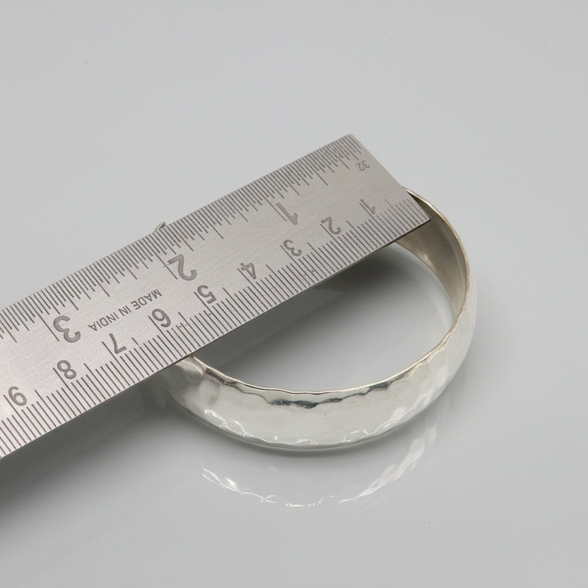 925 sterling silver adjustable bangle bracelet with shiny bright spotted design, by TRIBAL ORNAMENTS.