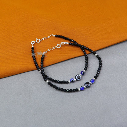 925 sterling silver evil eye black beaded chain bracelet combo, suitable as mother or baby anklet, with intricate silver and bead details.