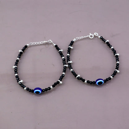 Sterling silver and black beaded evil eye bracelet combo, suitable for mothers or babies, by TRIBAL ORNAMENTS.