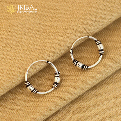 Sterling silver Bali hoops earrings with ball design, featuring tribal ethnic jewelry style from TRIBAL ORNAMENTS.