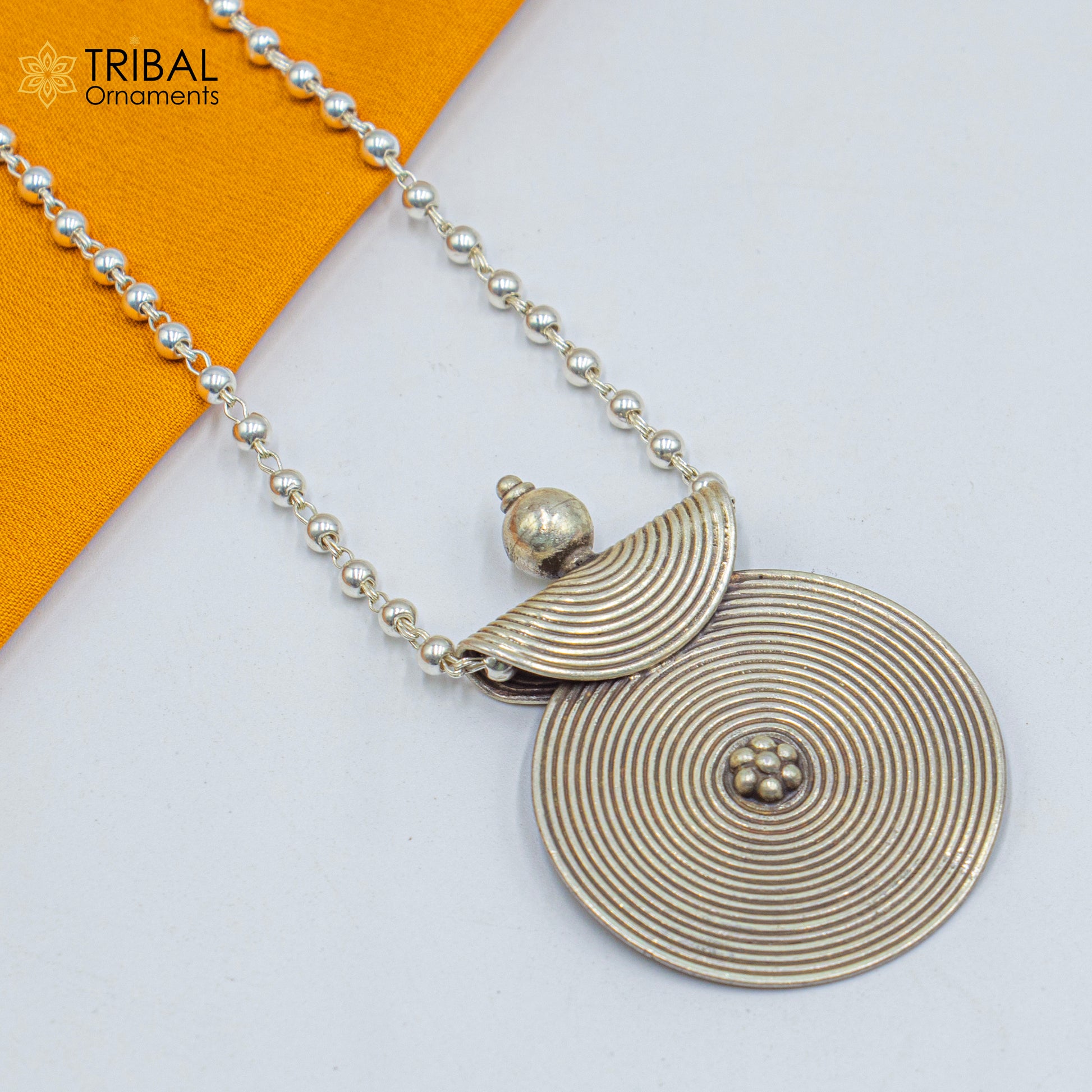 925 sterling silver beaded chain with spiral ethnic pendant and matching tribal jewelry set featuring intricate design.